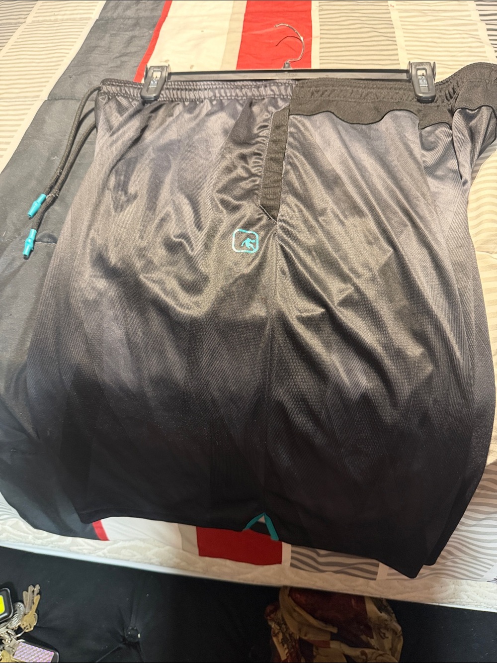 And1 Men's Black Athletic Mesh Shorts with Teal Accents